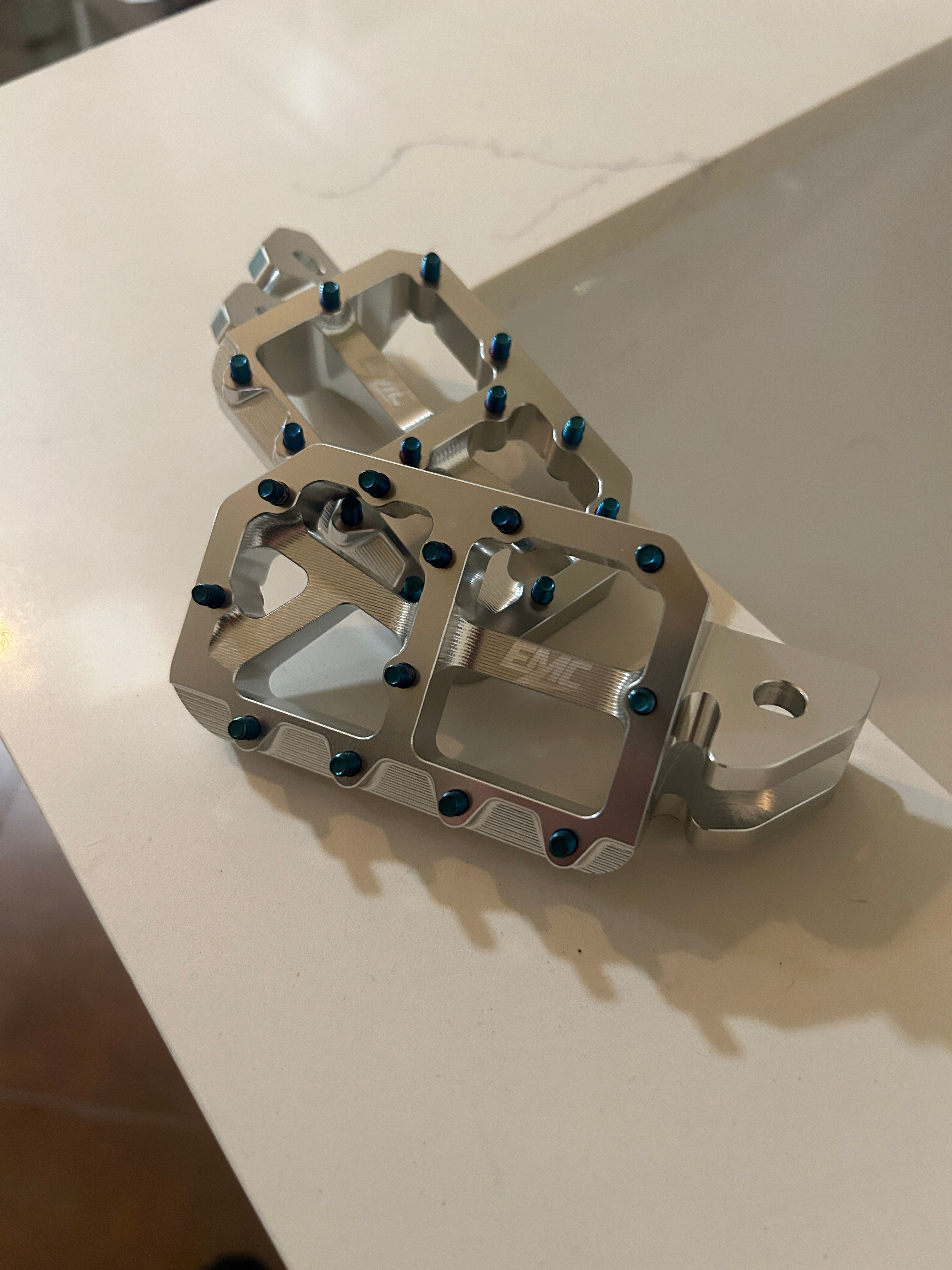 Raw pegs with titanium pins