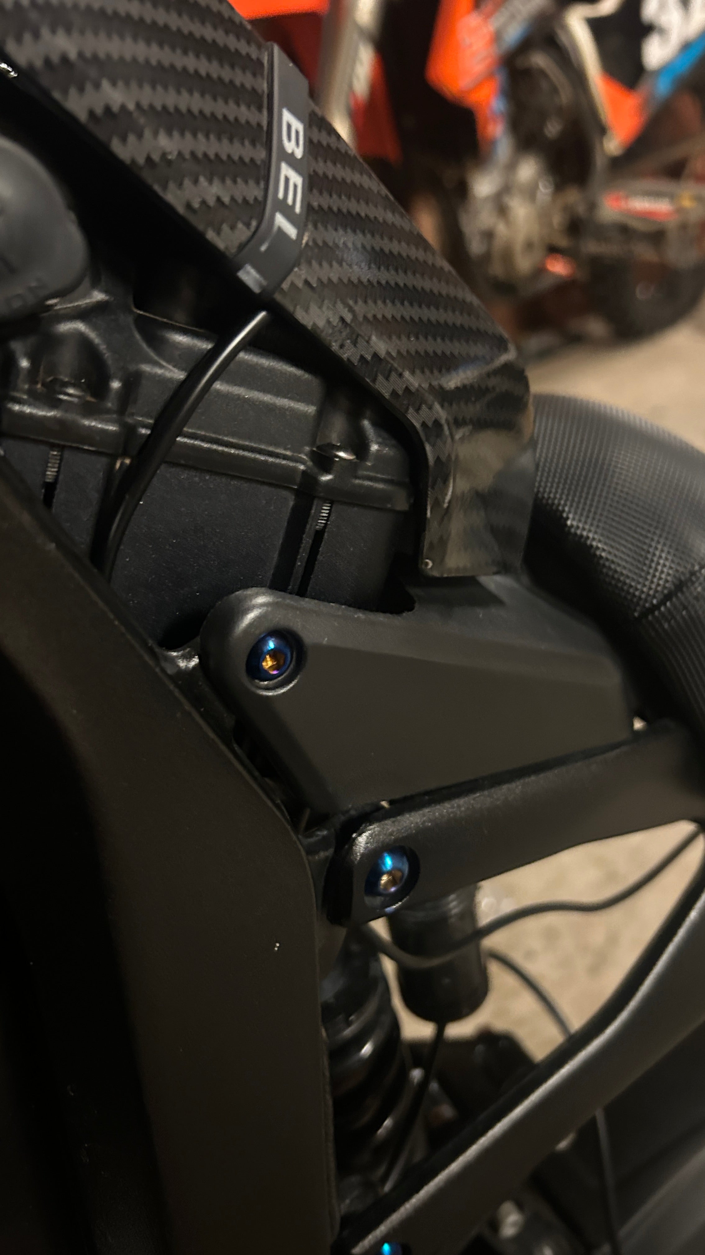 Battery lid lock titanium